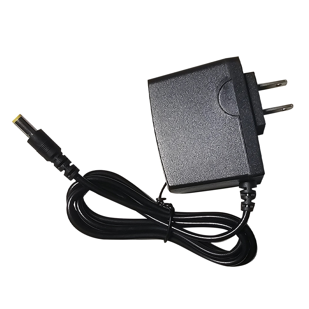 Black wall power adapter with plug on a white background for Plash Junior handheld LED spotlght.