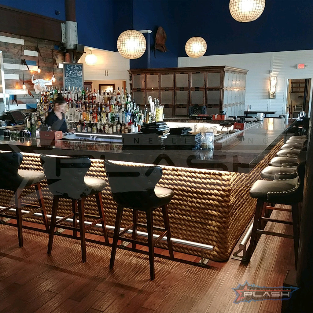 Custom LED Lighting installed under inside & outside bar at Number 13 in Galveston by Plash