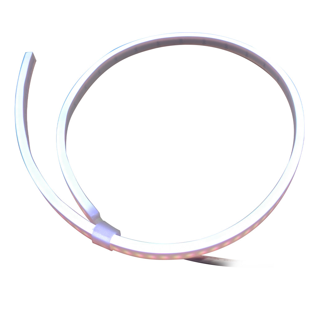 A flexible white LED light strip coiled in a large circle on a plain white background.