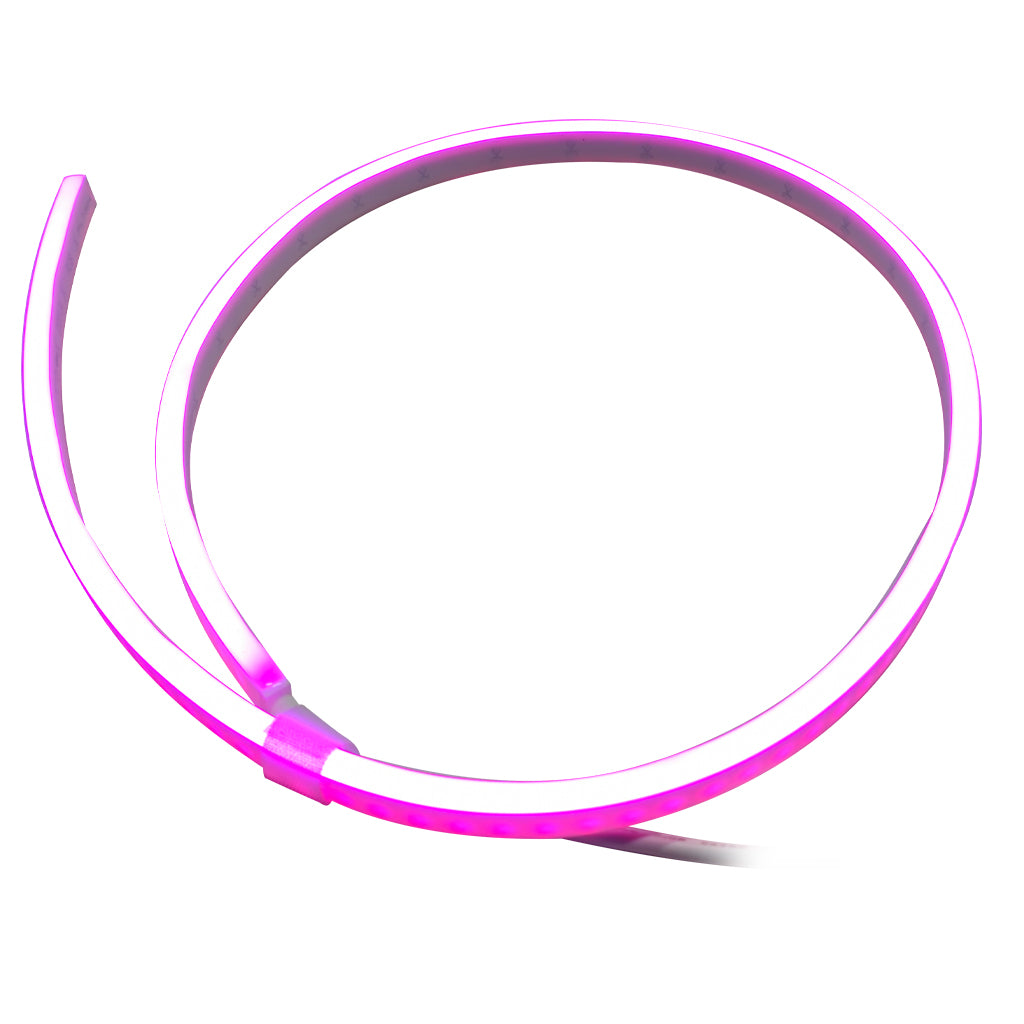 A flexible Pink LED light strip coiled in a large circle on a plain white background.