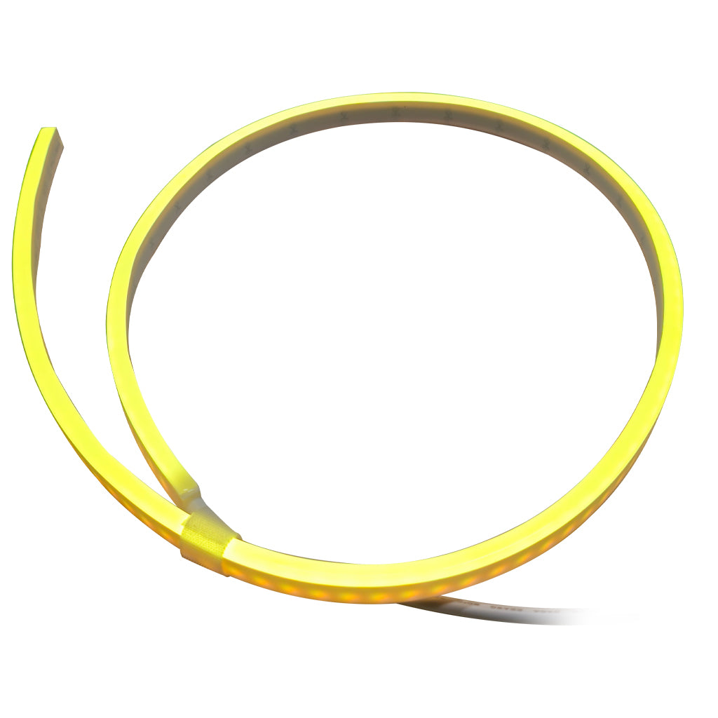 A flexible yellow LED light strip coiled in a large circle on a plain white background.