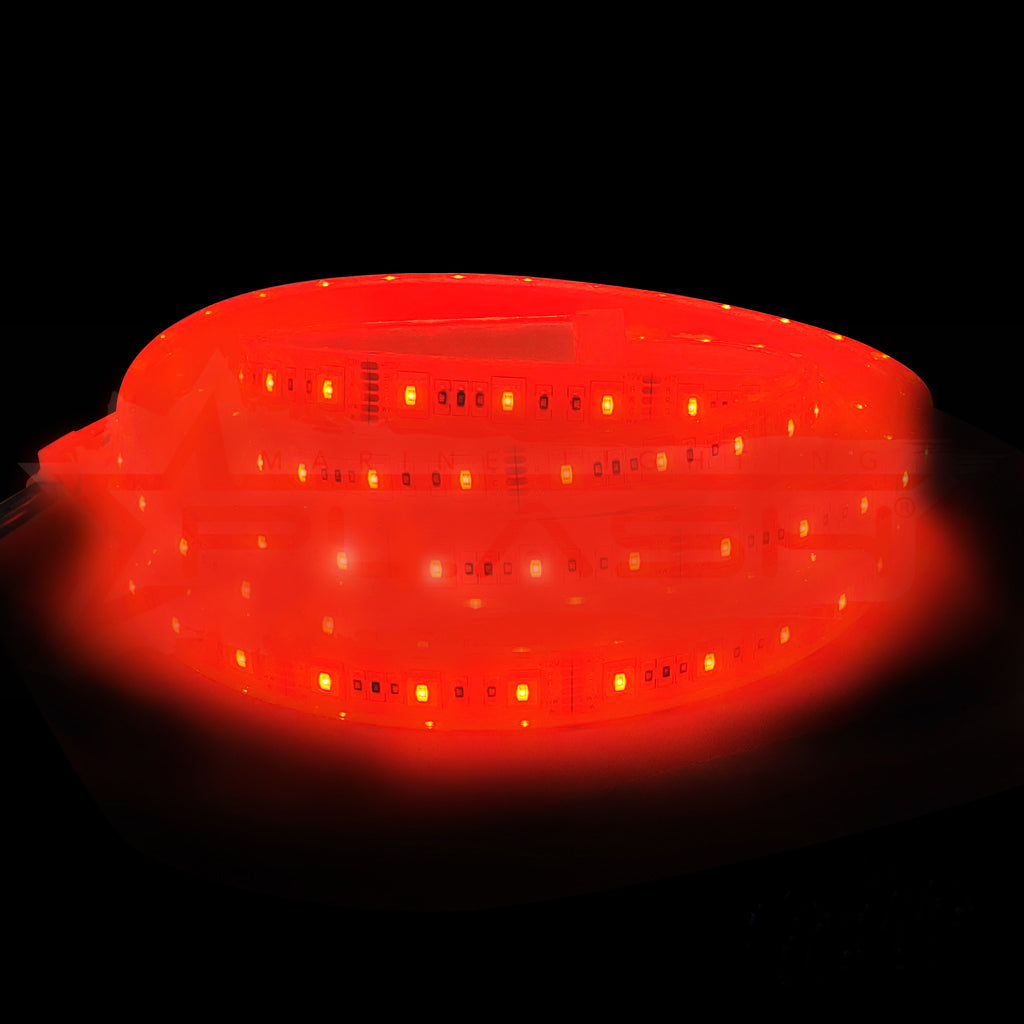 Red RGB CCT LED flexible strip light on a black background