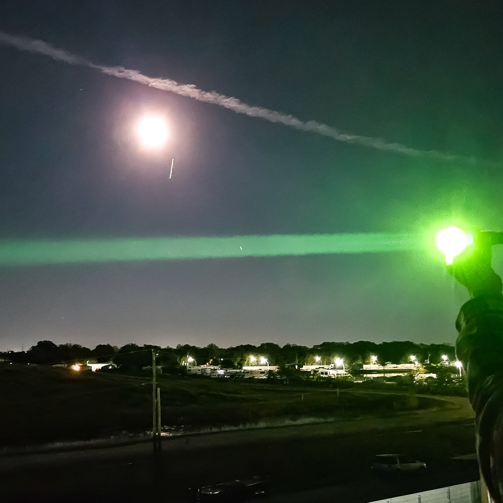 PL50X Dual Color Hunting Light Green/White Rechargeable LED Light Showing the Beam Distance and Intensity
