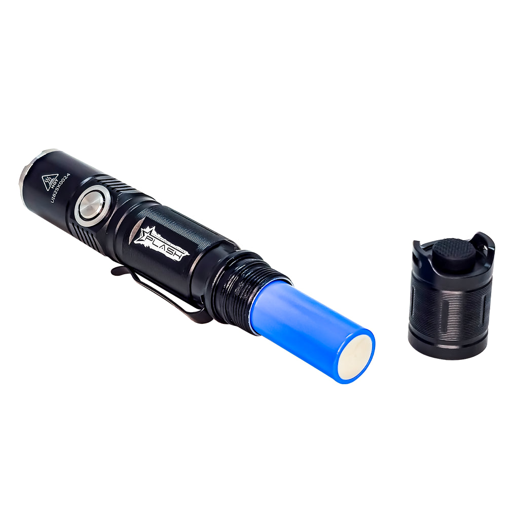 Black LED flashlight with blue rechargeable battery on a white background