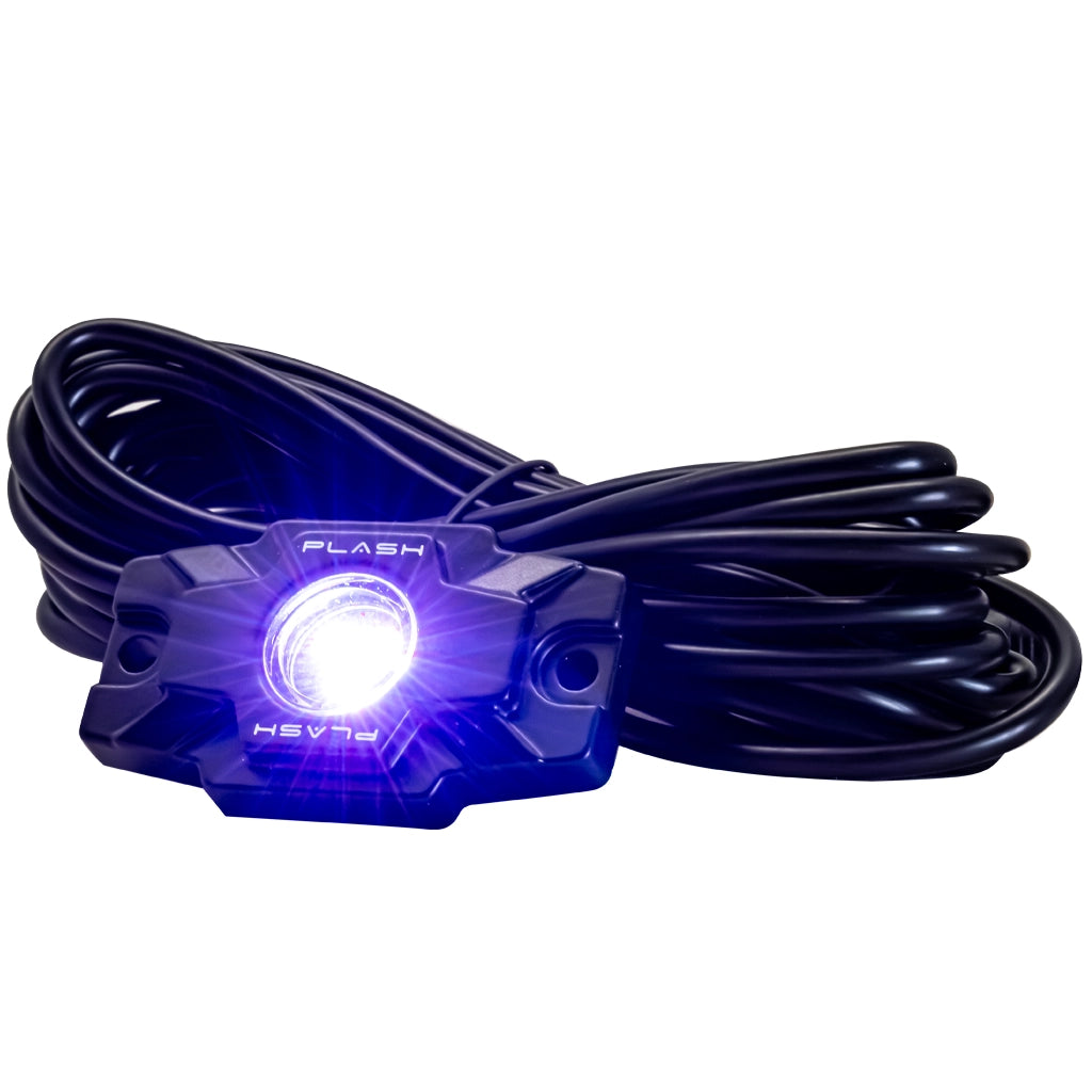 A black Plash Branded LED Rock light with a coiled black cable, shown with its Purple LED lights illuminated, on a solid white background.