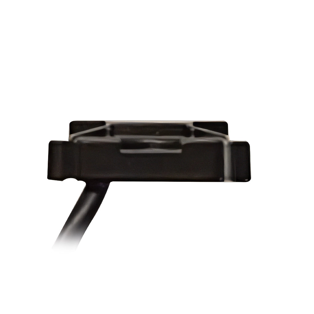 A black Plash Branded LED Rock light with a coiled black cable, shown on a solid white background.