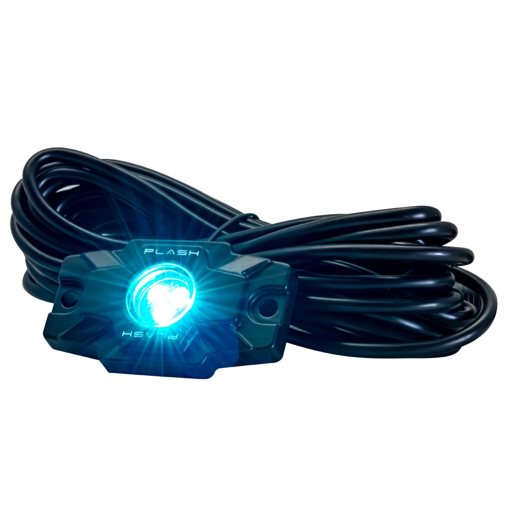 A black Plash Branded LED Rock light with a coiled black cable, shown with its teal LED lights illuminated, on a solid white background.