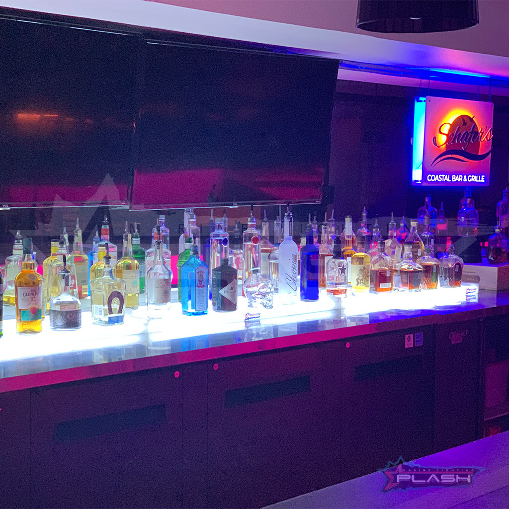 Custom LED acrylic liquor shelf for bar at Schaffers Bar in Clear Lake Shores TX by Plash
